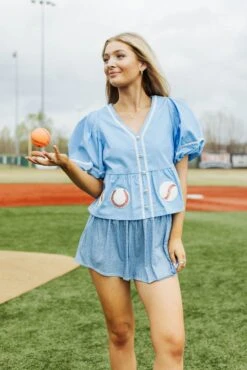 Queen Of Sparkles Light Blue Peplum Baseball Top